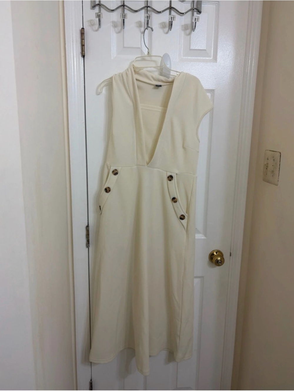 Sleeveless Cream V-Neck Midi Dress with Button Pocket Detail